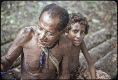 M'lapokala (Mogiovyeka's father) and a boy