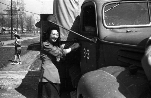 Woman with truck in Jerome camp