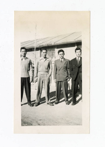 James Osamu Saito with young men at Granada camp