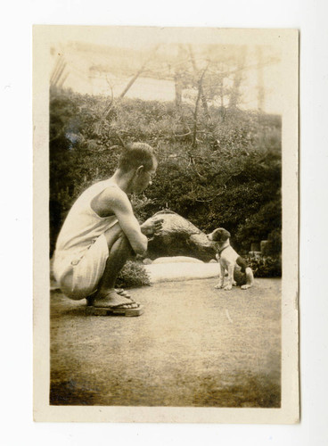 Suekichi Futakawa with a dog