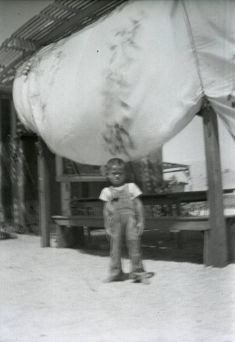 Child standing outside