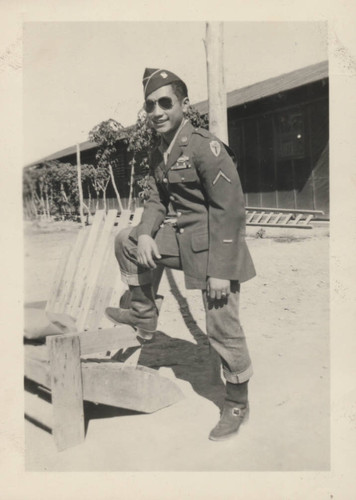 Mitsuru Yagura in military 442nd Regiment uniform and sunglasses at Poston incarceration camp