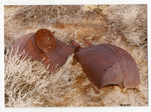 Photograph of a rusted fender and head lamp frame