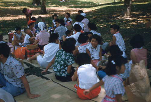 Women, men, and children at Little Miss picnic