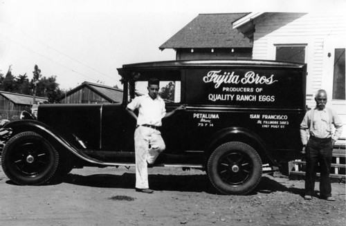 [Tsuneji Fujita and Katsumi Henry Fujita in front of Fujita Brothers Egg Ranch truck]