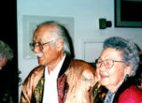 [Manzanar 2001 exhibit at the Japanese American Cultural and Community Center; Henry Fukuhara and his wife at a restaurant with others;]