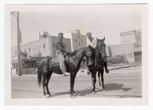 Men sitting on horses