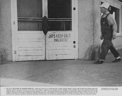 [Sign on a] barbershop door in Parker, Arizona, "Japs keep out you rats"