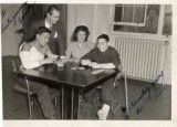 Alan Ladd, Sue Carroll [Carrol], and Bill Kato [with an injured man]