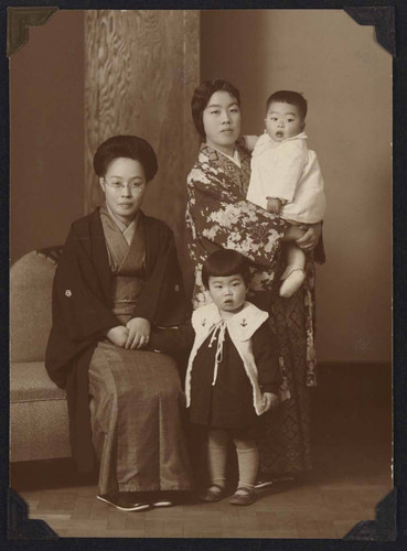 Group portrait of two young and children