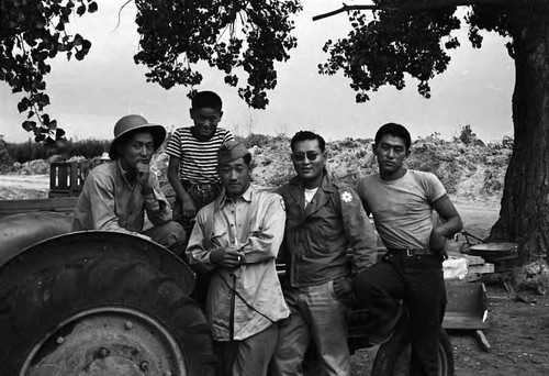 Farm workers including Sadao Yatabe and Takashi Ishida