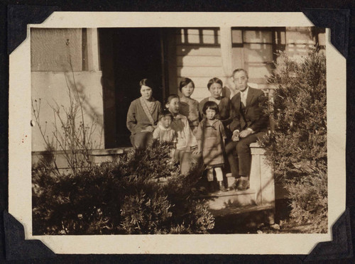 Family sitting on porch