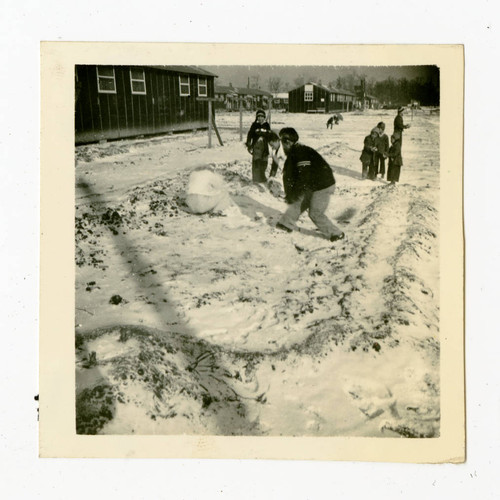 Playing in snow in Jerome camp