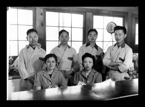 Mr. and Mrs. Nabeshima and H. Dairiki in the canteen, Amache Co-op