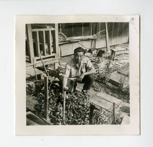 Man in victory garden at the Jerome camp