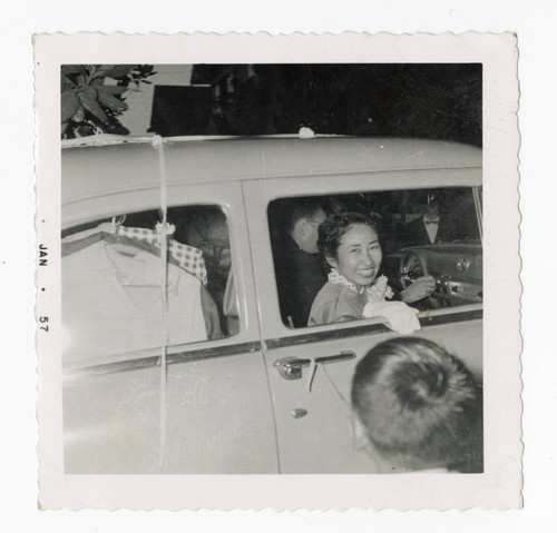 Florence Sumire and Robert Griffen driving away from wedding