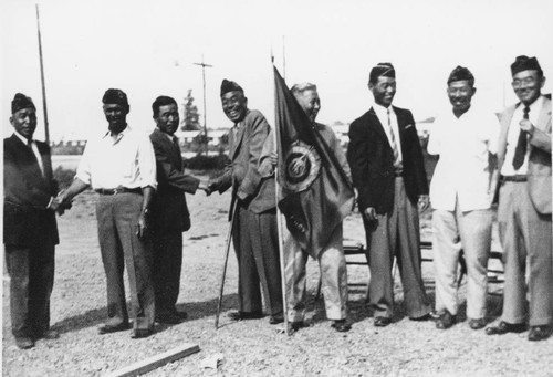 World War I American Legion friends shake hands