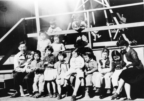 [Group photograph of children and caretakers at Children's Village]