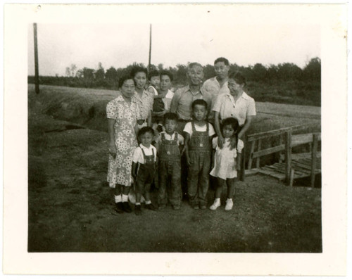 Group of men, women, and children at Jerome incarceration camp