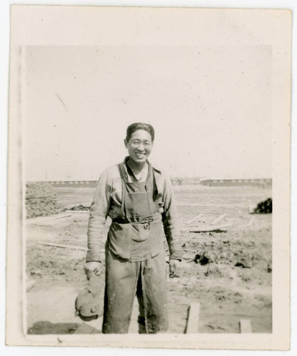 Man holding hat at Jerome incarceration camp