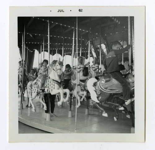 Children on a carousel