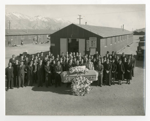 Exterior photograph of a funeral for Roy Nakagawa