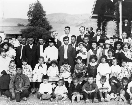 Group photograph including Masaichi and Kumekichi Ishibashi