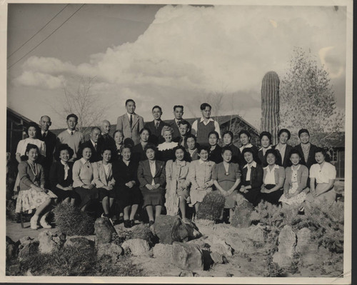 Group photograph among the cactus at Poston incarceration camp