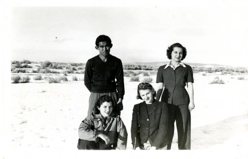 [Group photo in desert]