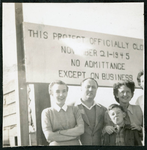 Photograph of Bea White and son, with Lucille Bouche and Elizabeth Moxley at the closing of Manzanar