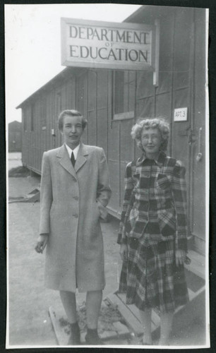 Photograph of Lucille Bouche in front of the Department of Education