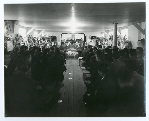 Interior photograph of the funeral service for Sumiichi Toma