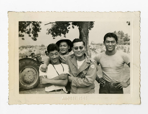 Farm workers including Sadao Yatabe and Takashi Ishida