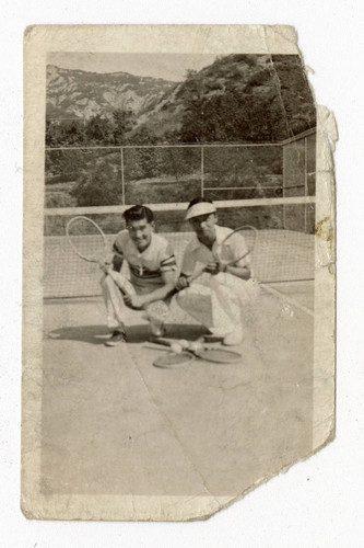 Men playing tennis