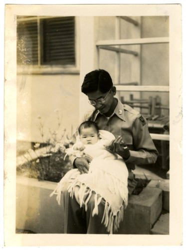 Davis Abe holding Lisa Jo Furutani