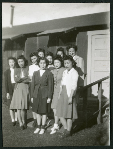 Photograph of hospital staff standing in front of the Manzanar hospital