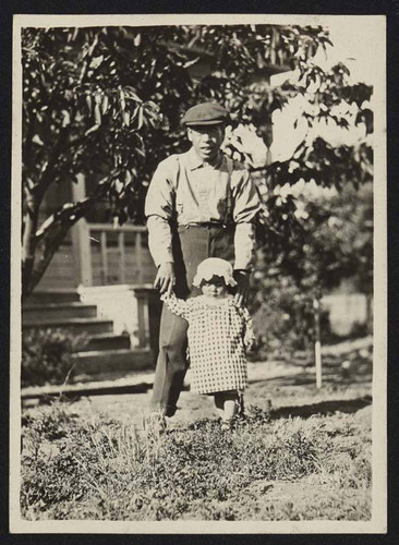 Man and young girl outside