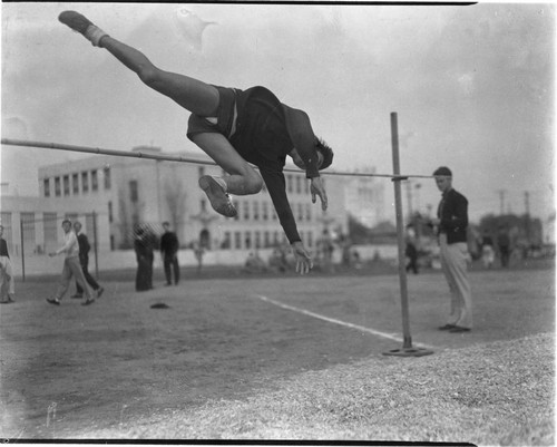 Minoru Frank Saito practicing high jumping