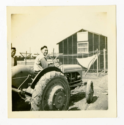 Man on tractor in Jerome camp