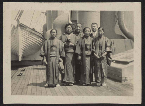 Women and men on boatdeck