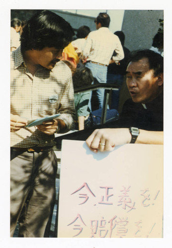 Alan Nishio and Reverand Paul Nakamura at 1982 Day of Remembrance