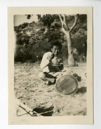 Roy Kato enjoying his out-of-camp breakfast, Kato family album