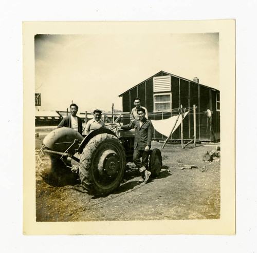 Men and a tractor in Jerome camp