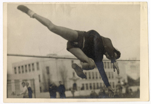 Minoru Frank Saito practicing high jumping