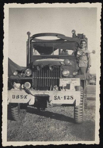 Military vehicle at motor pool