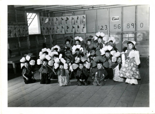 [School children as flowers]