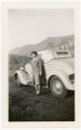 Reiko Yoshinaga standing in front of Dodge car