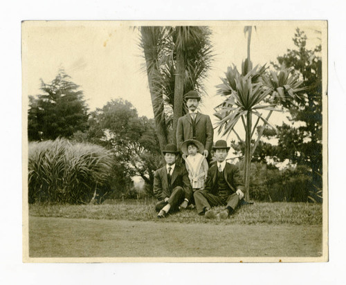 Tanjiro Saito with his son and friends