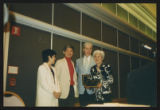 Aiko Herzig Yoshinaga and Jack Herzig accept award at Association of Asian American Studies awards ceremony