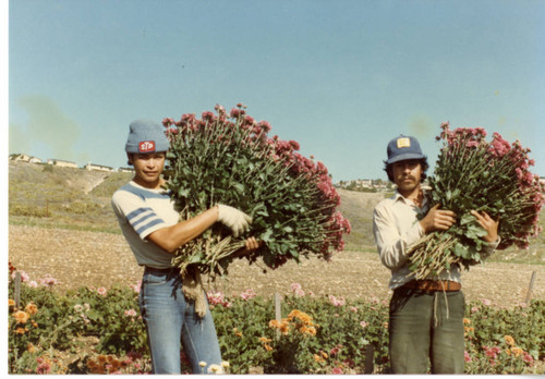 Two workers with Flowers